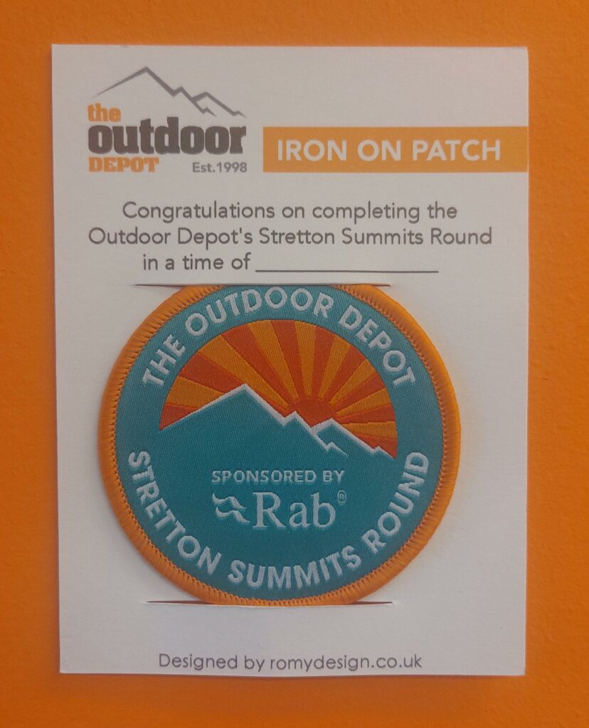 The Outdoor Depot Stretton Summits Round badge has been designed by Romy Design in Shrewsbury.